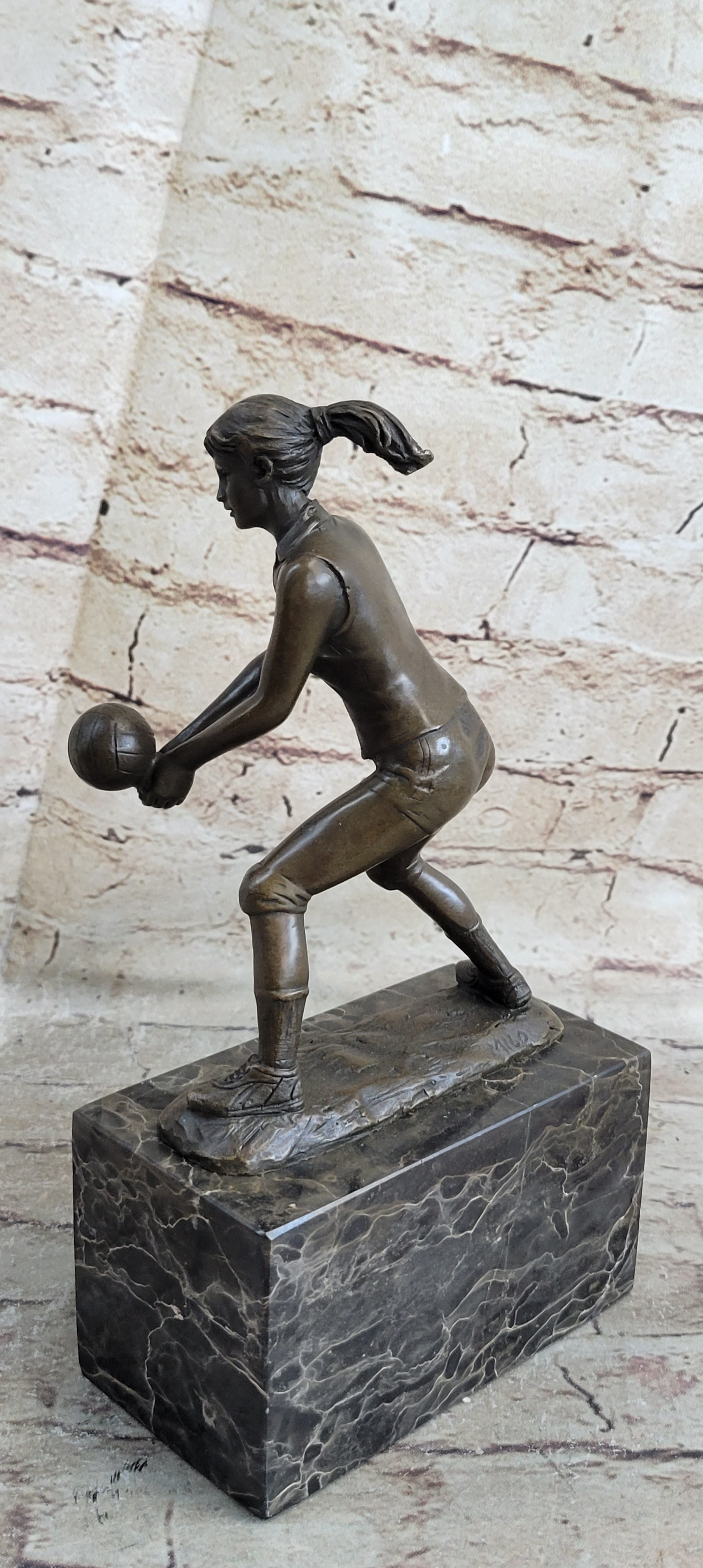 Bronze Cup Female Volleyball Player after Milo. bronze and handmade Decorative